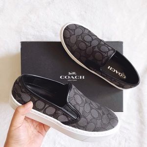 black coach slip ons